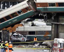 Amtrak train on new route hurtles onto highway, kills 3